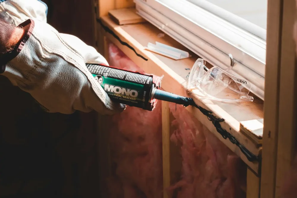 A window being installed in a home.