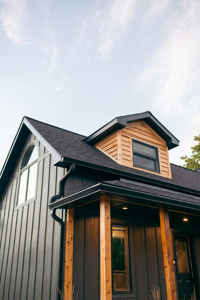 a beautiful home with black gutters