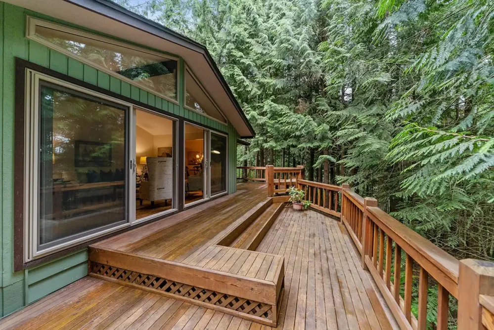 a beautiful deck in a forested area